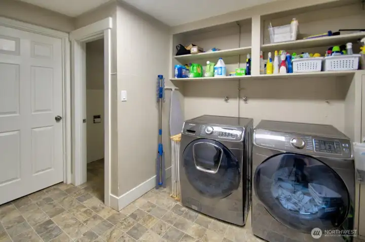 Lower level utility room - has half bath and shower