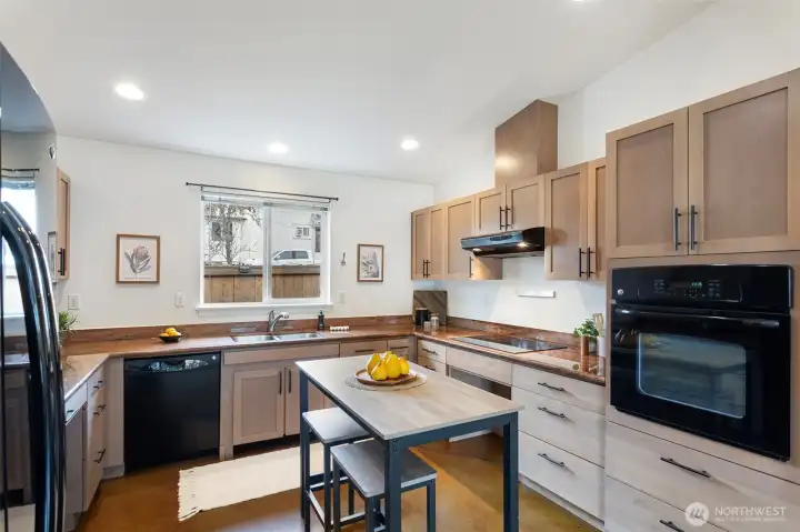 Large kitchen with ample storage.