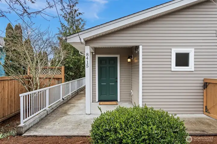Front entry with a ramp that leads to two additional points of entry on the south side of the home.