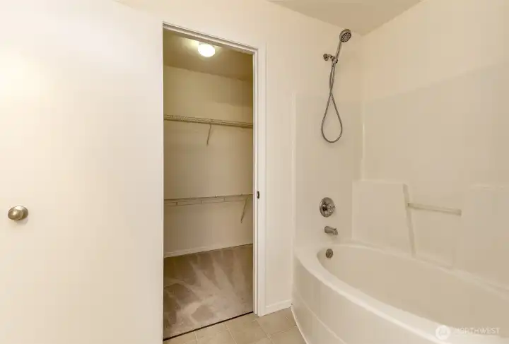 5 piece primary bathroom features soaking tub, shower & double sinks