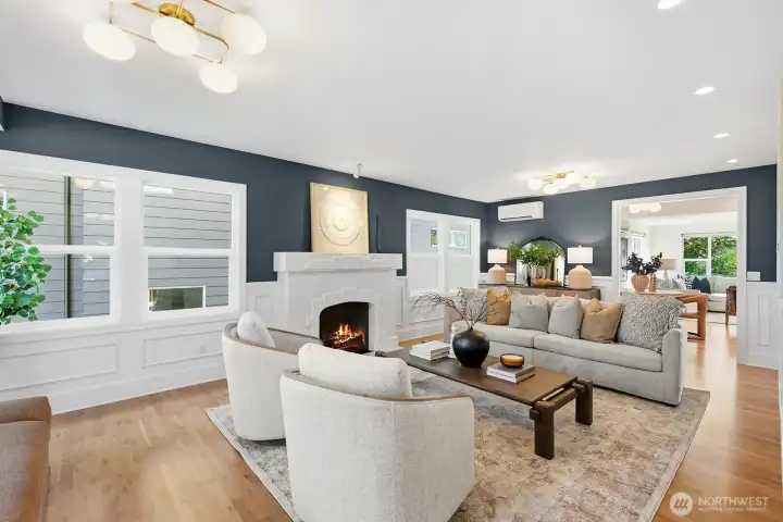 Living room with wood burning fireplace - a perfect place to get cozy on rainy nights!