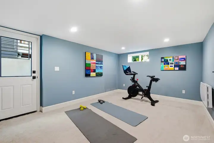 Excellent bonus room perfect for a home gym or a home office with convenient exterior entrance.