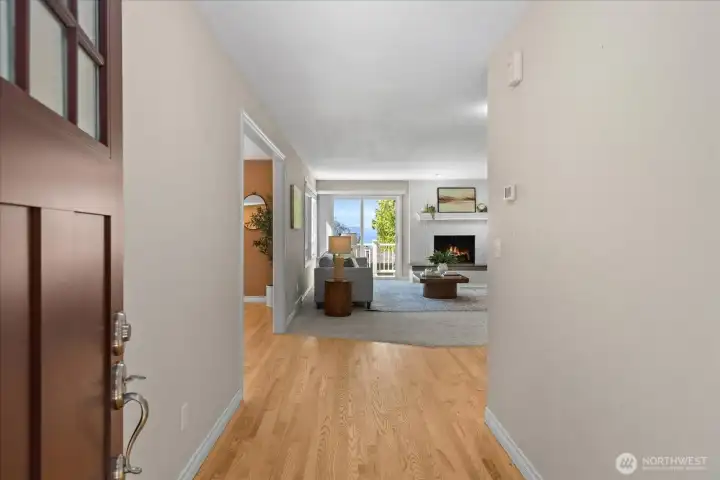 Gorgeous newly refinished hardwood greet you upon entry.  The first thing you see is the stunning view from the living room window.