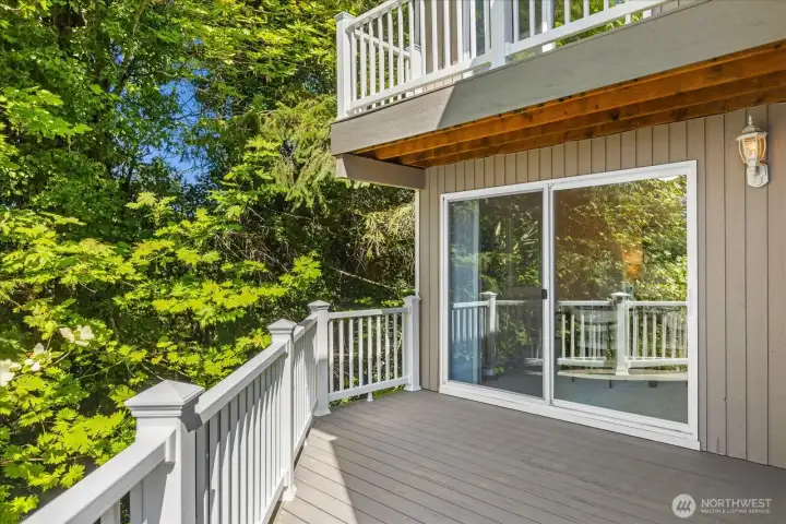 This outdoor living space is perfect for entertaining, offering a seamless transition from the home's interior to the beautiful scenery.