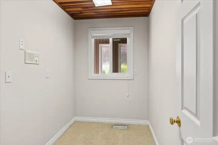 Main floor flex space could be a small office, yoga space or storage.