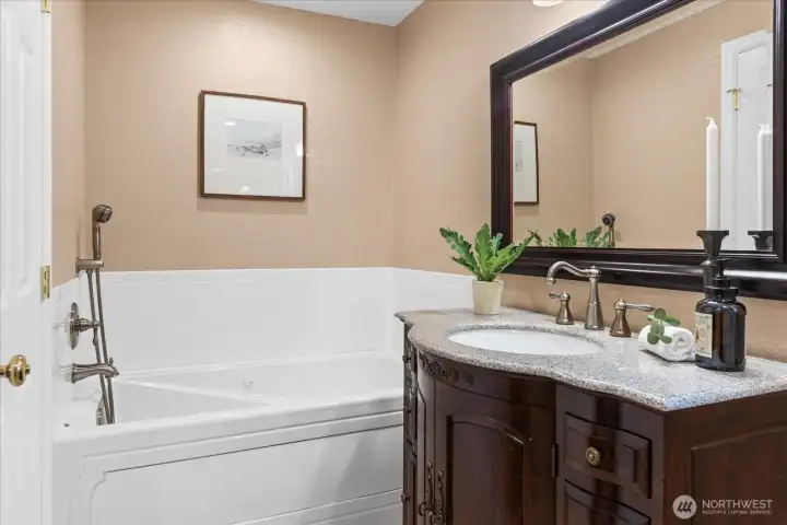 Jetted soaking tub to wash all your cares away!