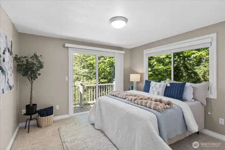 Second bedroom with private balcony for gazing at the views.