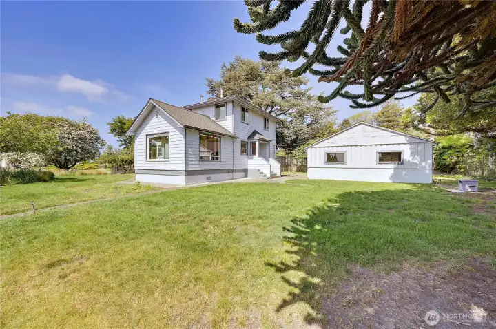 Detached garage and plenty of sunny space to garden.
