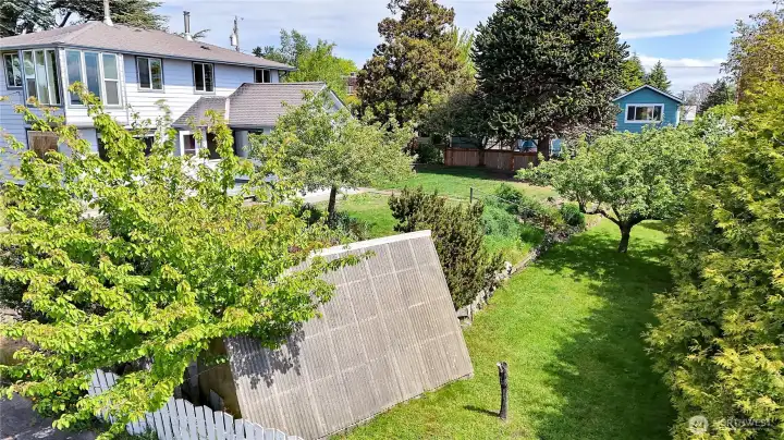 Partially fenced and a greenhouse, too.