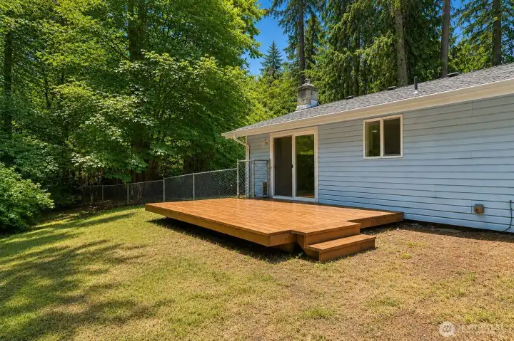 What a great deck directly off the kitchen and dining/2nd living room! Pure indoor-outdoor living with so much privacy - greenbelt facing.