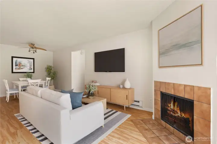 Welcome home. Cozy up to the wood burning fireplace in the living room. *Virtual Staging