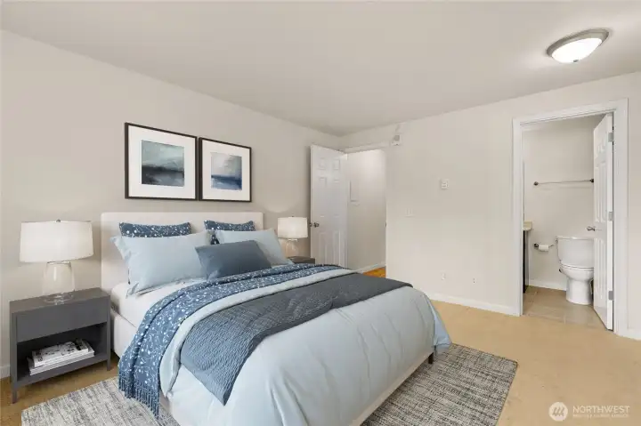 Main bedroom is light and bright - ensuite bathroom entrance. *Virtual Staging