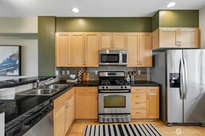 Bright Kitchen with Maple Cabinets and flooring
