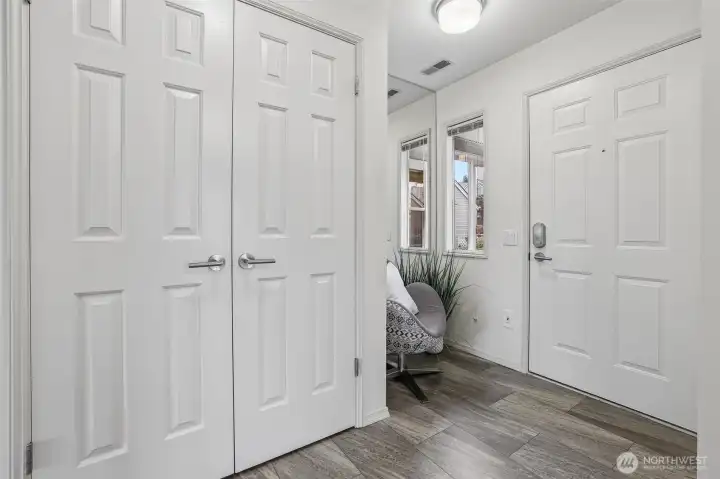 Lovely entry with coat closet.