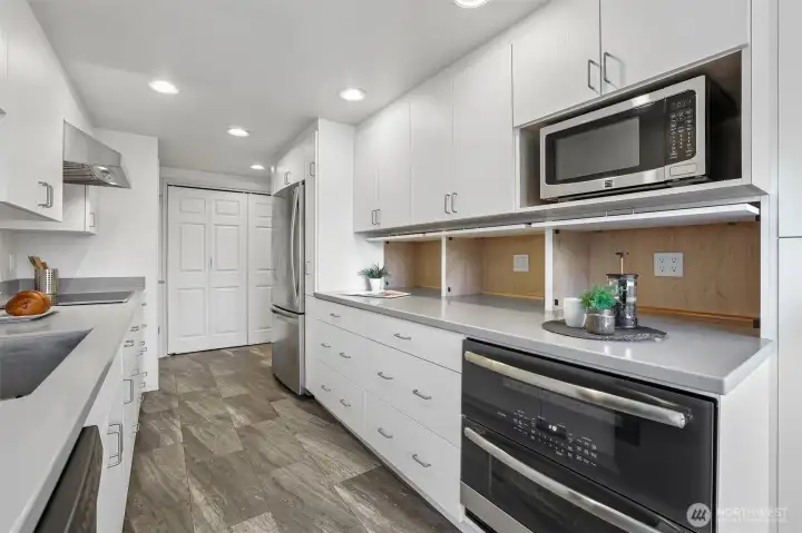 Open the cabinets to access your additional appliances, coffee maker, toaster.