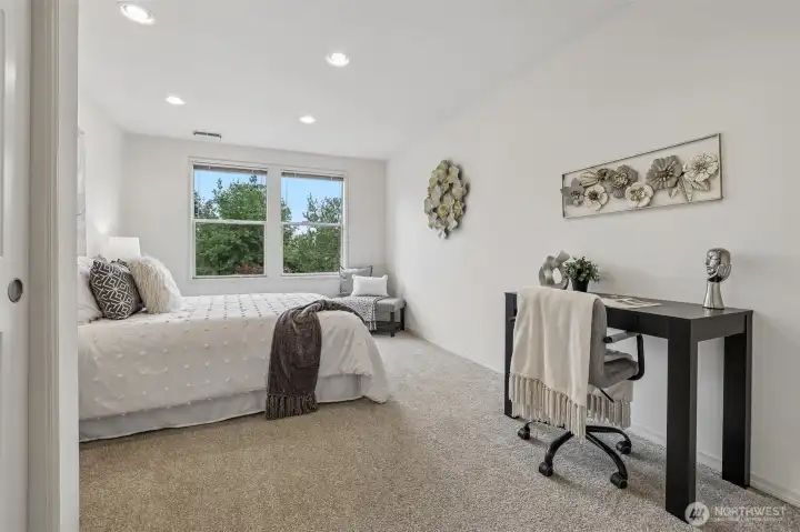 Bedroom 2 is on opposite side of floorplan