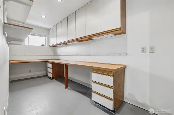 Cabinetry, window, A/C for additional work space.
