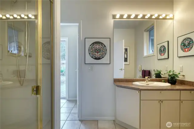 Main floor bathroom with steam shower