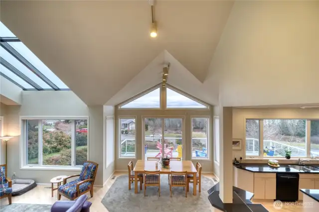 Dining area with doors to expansive deck