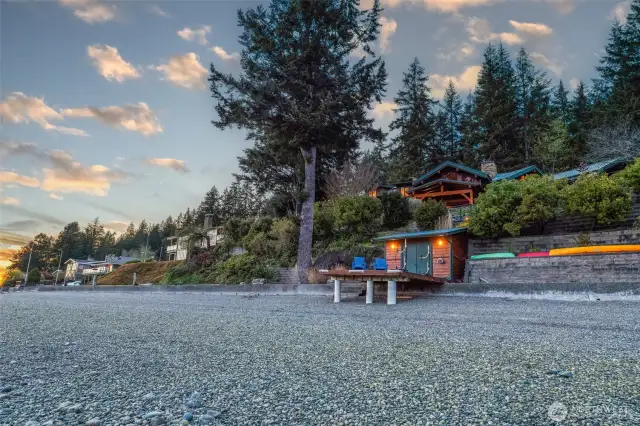 Nothing better than relaxing at water's edge on your deck. It's an easy walk up the path to the house.