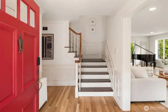 A Bold welcome to classic millwork, rich hardwoods, and sunlit sophistication.