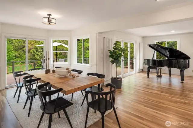 Designed to entertain—with gleaming hardwoods and creekside views.