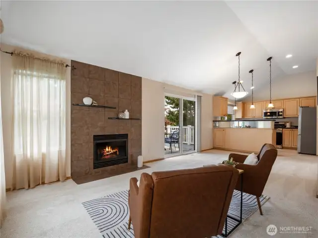 This great room features brand-new plush carpet that extends throughout the house.