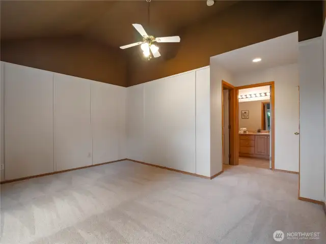 The Primary Bedroom has high ceilings and is also finished with brand-new carpet.