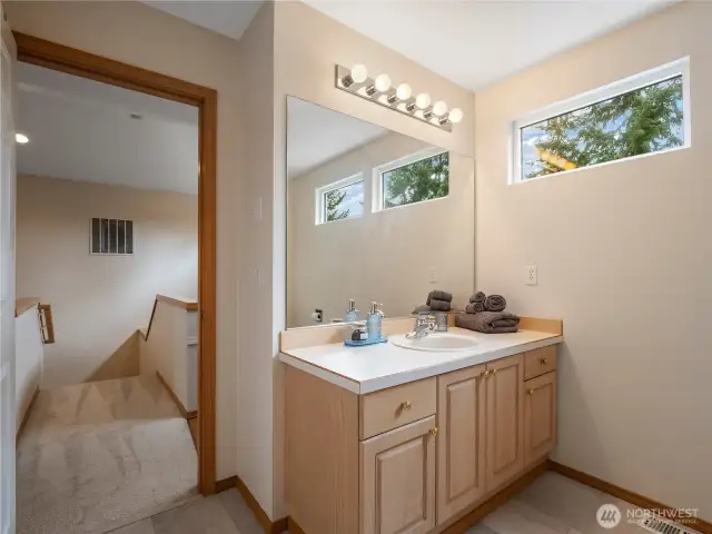 On the second level, you'll find the large bathroom, second bedroom, and office nook.