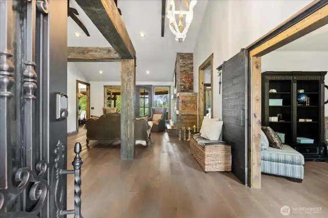 Warm welcome to the parlor and living room. Den off of the entry.
