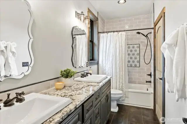 Jack and Jill bath with dual vanities.