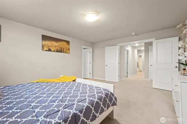 French doors leading to your Primary bedroom giving you the feeling of your own serenity oasis