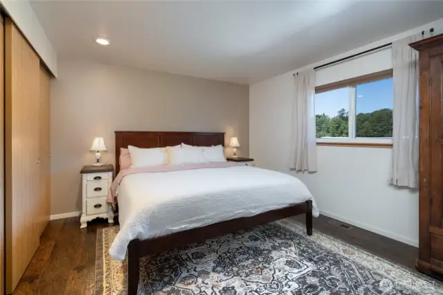 Primary bedroom has room for king size bed.
