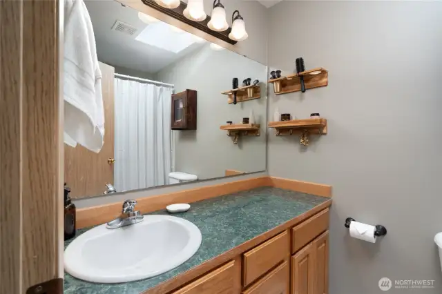 Primary bathroom with tub.