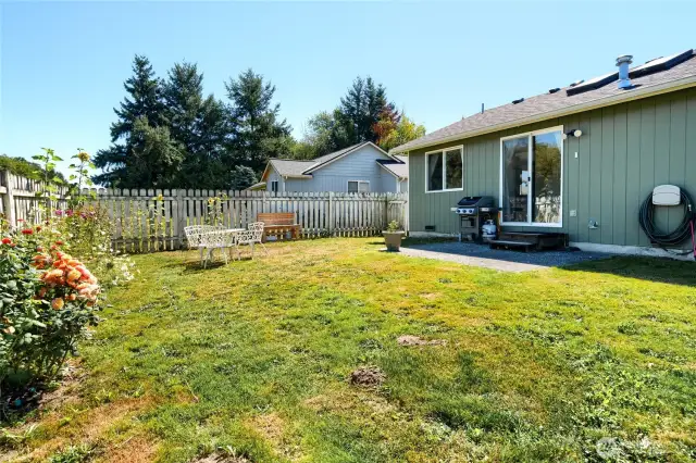 Fantastic fully fenced back yard with patio off living room. Open field behind home offers privacy and spacious country feel.