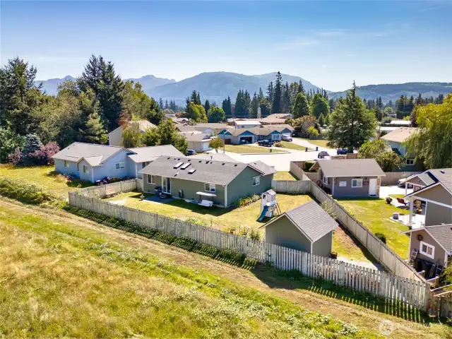 Fully fenced back yard offers privacy and security.
