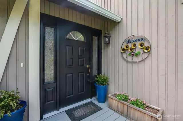 Cozy front porch welcomes you in.