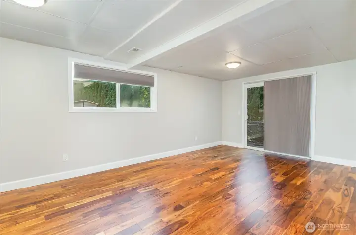 A comfortable living area awaits on the lower level for occasions and casual hangouts.