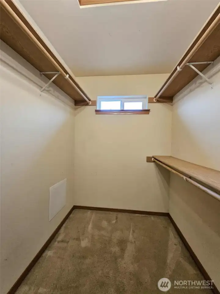 Walk-in master bedroom closet