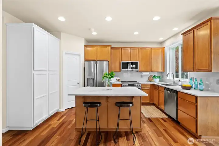 Storage galore with both full-height storage, pantry, and a large storage closet that goes under the staircase.