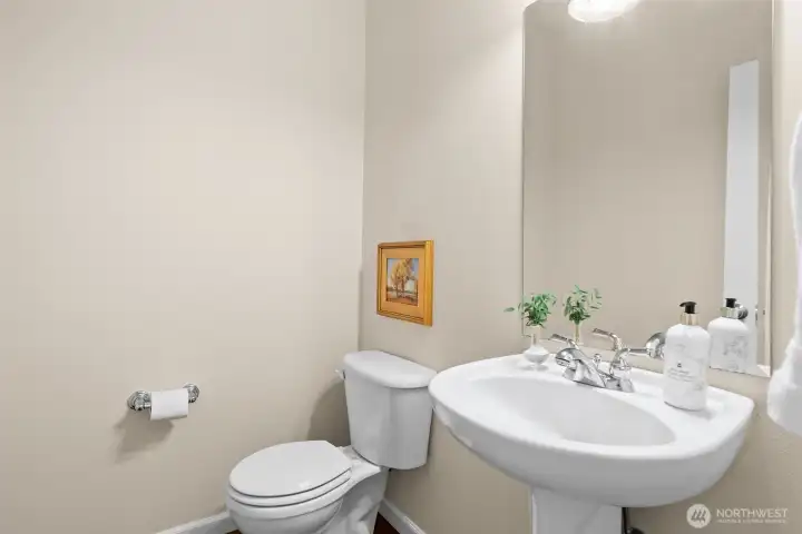The main floor has a functional half bathroom just off to the left from the entrance to the garage.