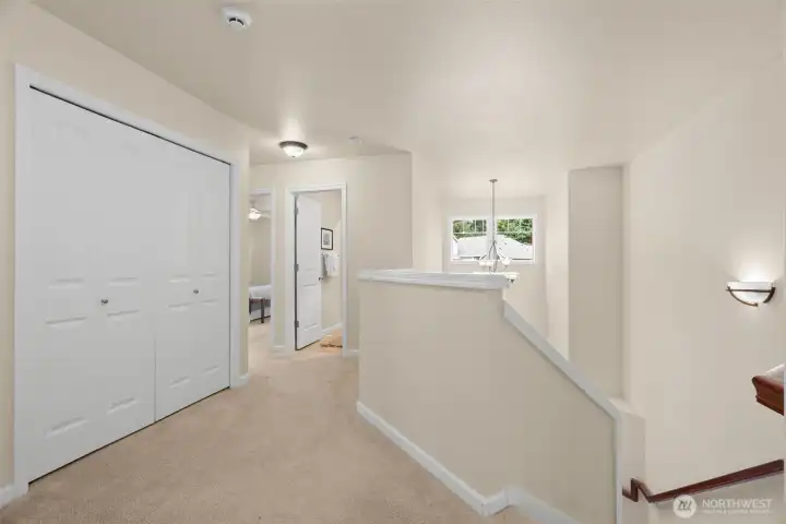 Upstairs, the ample storage continues with a large closet here - primary off to the right, and each room is private from one another, offering an ideal floorplan.