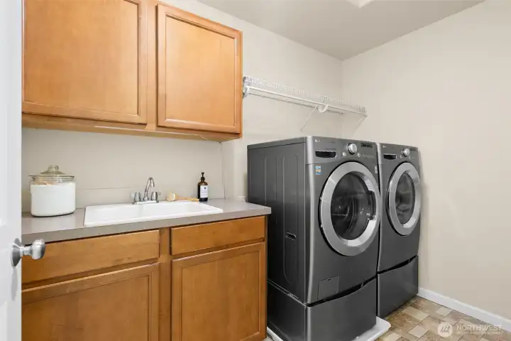 The upstairs utility room makes laundry a breeze - washer and dryer are included!