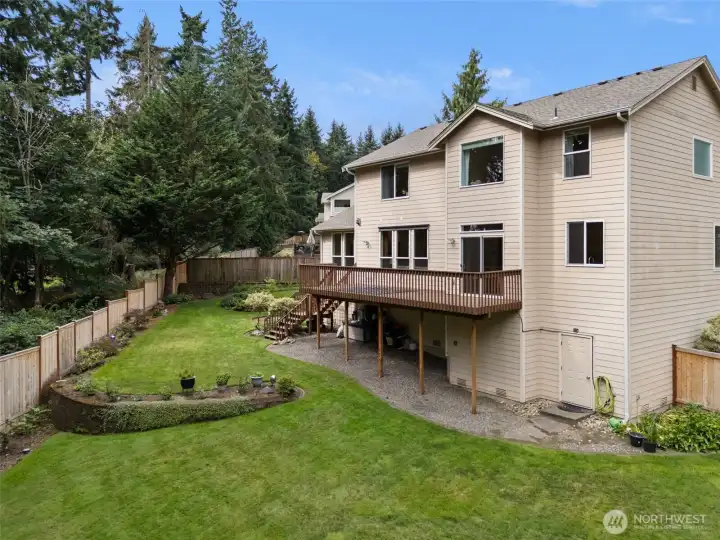 You will love the privacy and usable space that this beautiful back yard has to offer. Fully fenced, with garden spaces galore. You will find fruit trees, roses, raised bed areas and more. Did we mention that it backs up to a serene green belt for privacy and natural beauty?