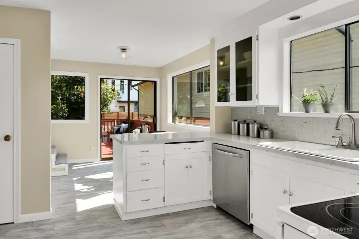 Cook's Kitchen with Abutting Breakfast Nook & Sliding Glass Doors to the Deck.