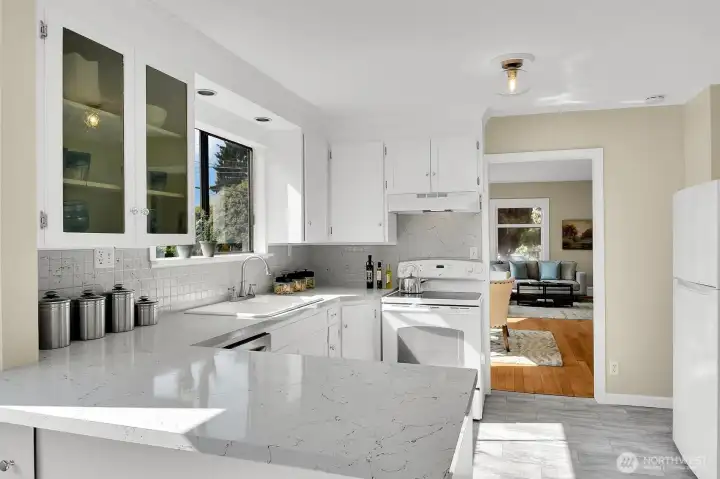 Cook's Kitchen with Abutting Breakfast Nook & Sliding Glass Doors to the Deck.