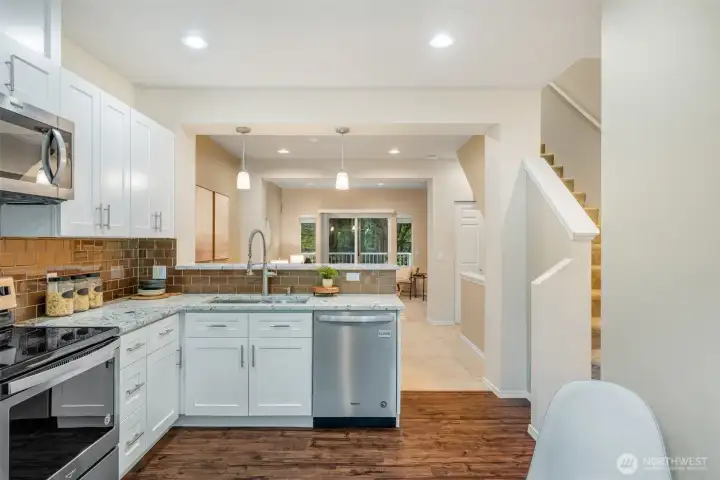 Almost new cabinets, countertops, sink & faucet