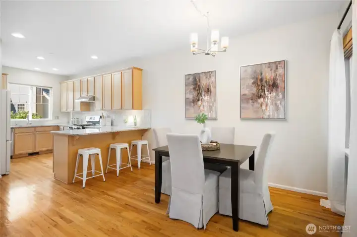 Open kitchen design flows seamlessly into dining area.