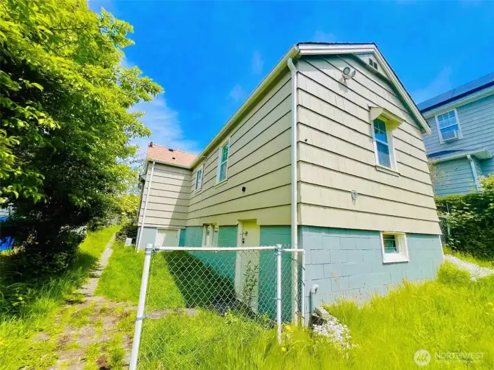 Side Facade leading to the Basement.