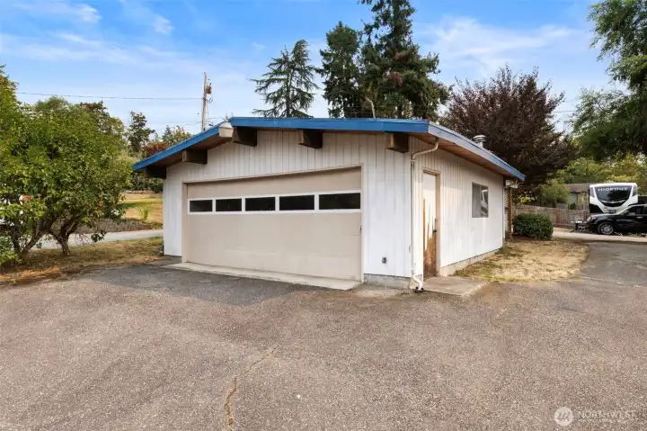 Large detached garage and plenty of room for extra parking.